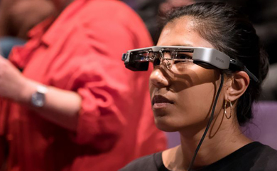 Woman wearing epson's smart glasses