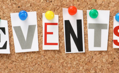 Close up image of cork board, with the word 'events' spelled out in individual capital letters