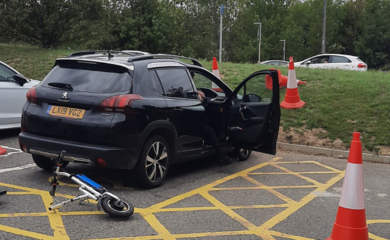 Car in blue badge parking space