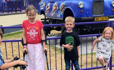 Image of 4 children in front of an old car at Cadburys World