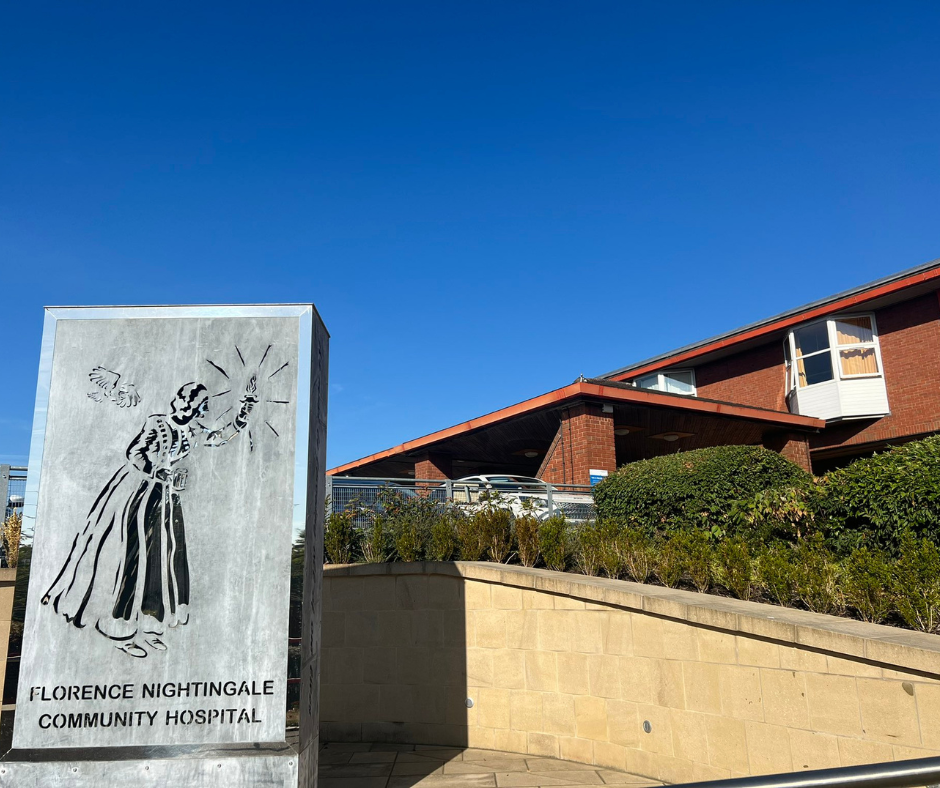 Image of a stone sign which says Florence Nightingale Community Hospital.