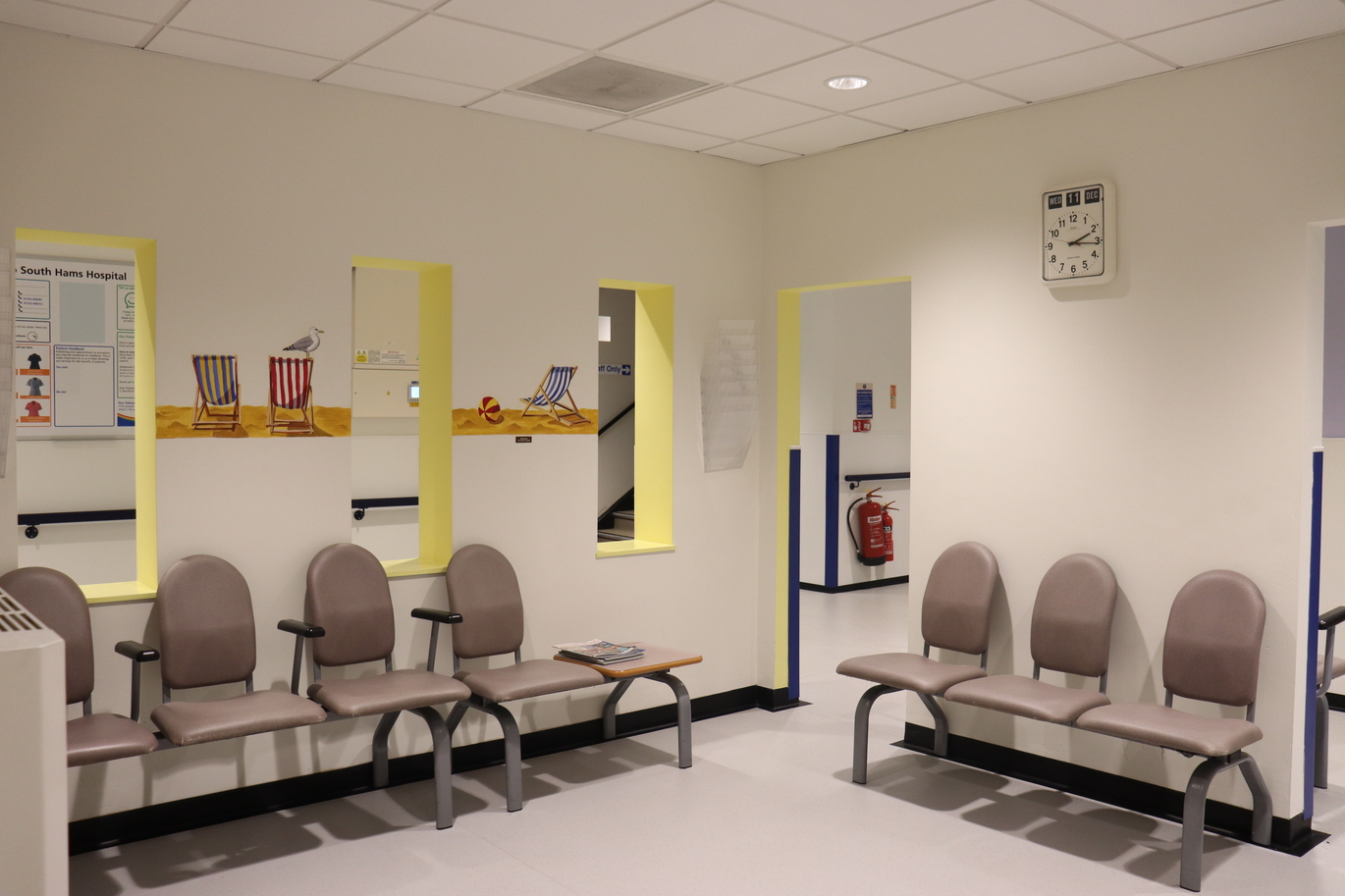 waiting area with seat around the edge of the room