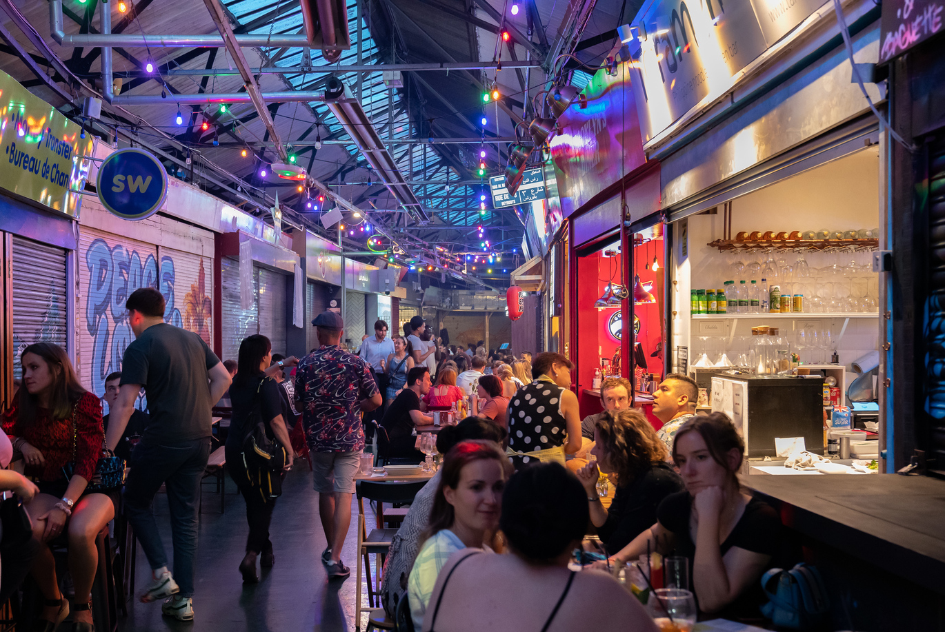 Tooting market interior shot, customers enjoying a drink.