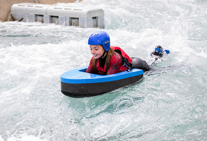 "A photo of a girl hydrospeeding"
