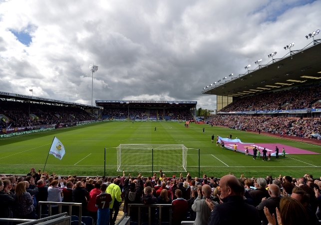 Photo of pitch on matchday with fans in crowd