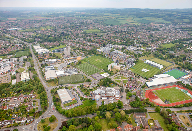 Aerial view of the university campus including sports field 