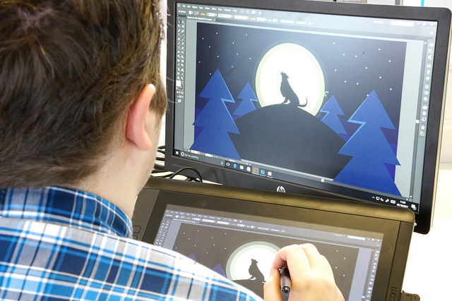 "Student carrying out design work on computer"