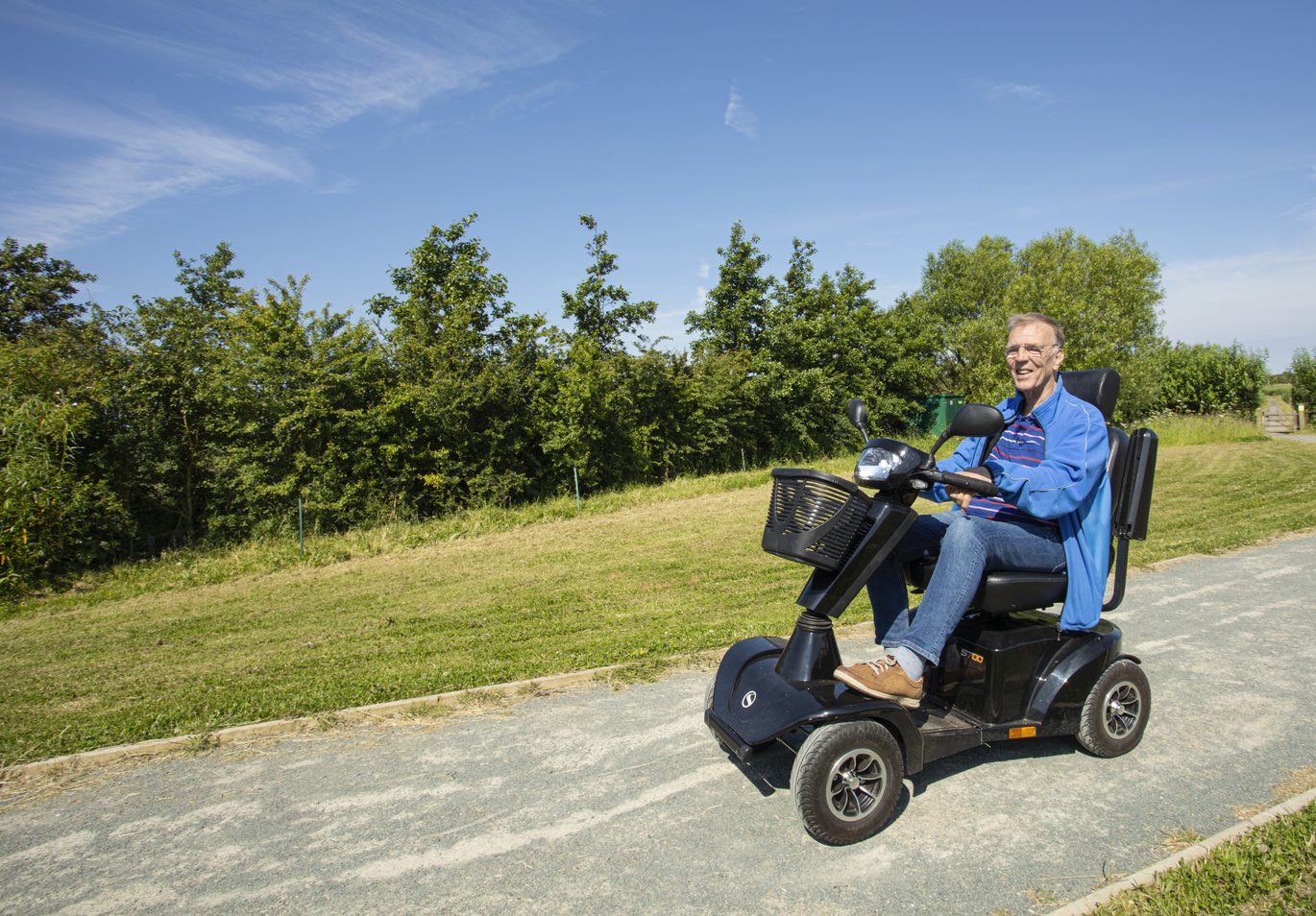 "Man in mobility scooter"