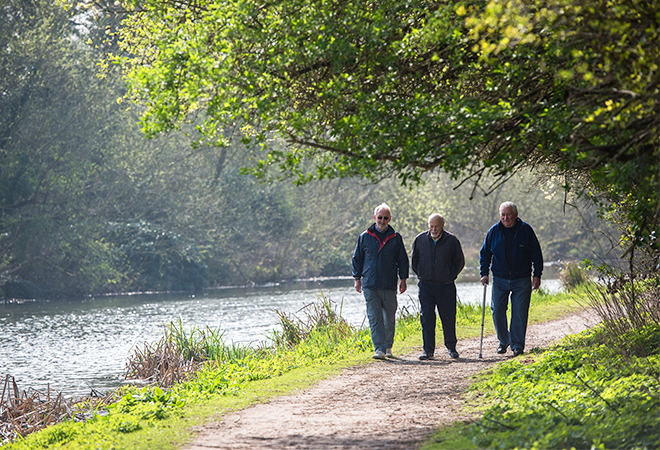 "A photo of some men walking"
