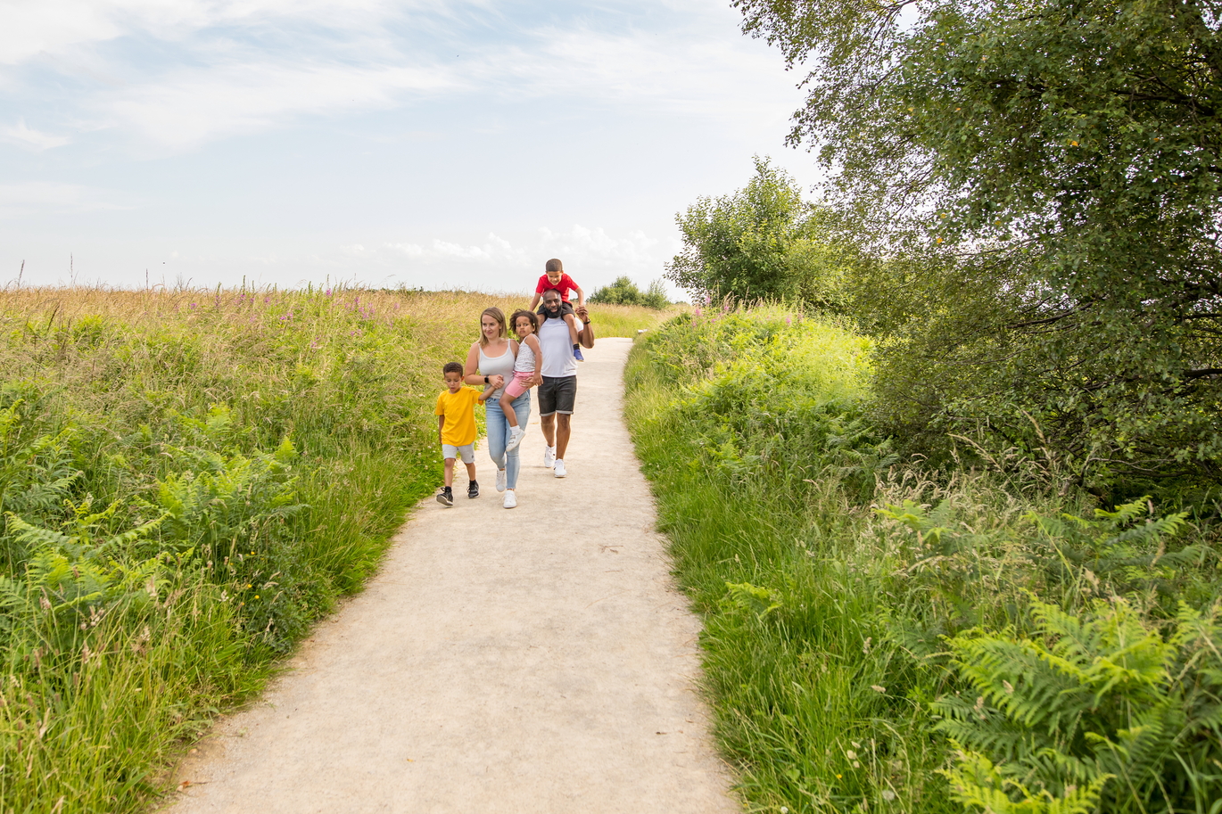 "Views of Sutton Bank with a family walking down the path"