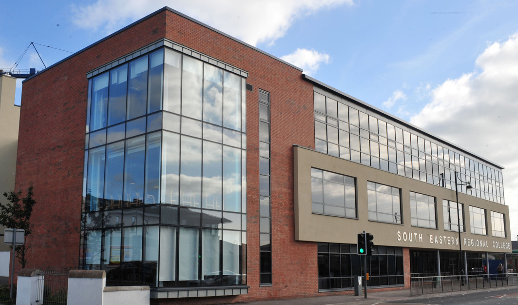 "Downpatrick Campus Block A with blue sky and clouds in background"