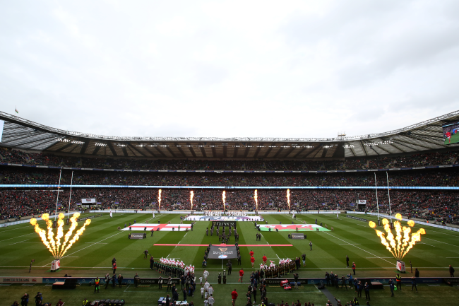 "teams walking out on to the pitch"