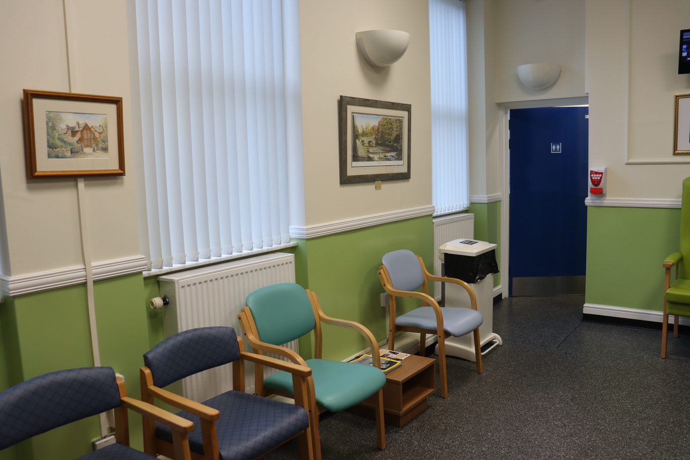waiting area with chairs against the wall