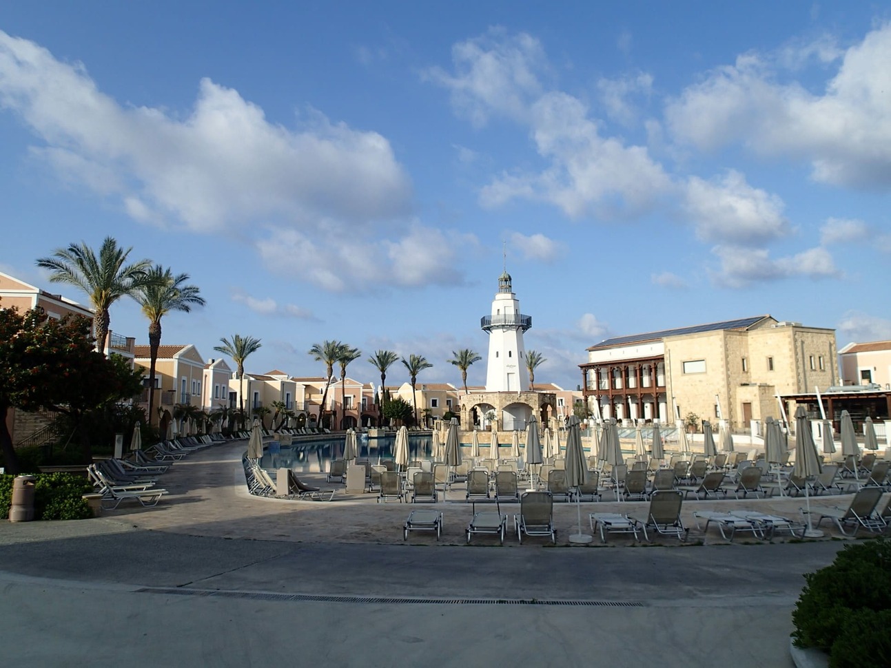 Aliathon Ionian Hotel pool view, lots of sun loungers around the pool area