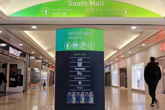 "Lewisham Shopping Centre sign with direction to Molesworth Street and mall map."