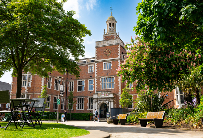 Student Union in background, green grounds in foreground
