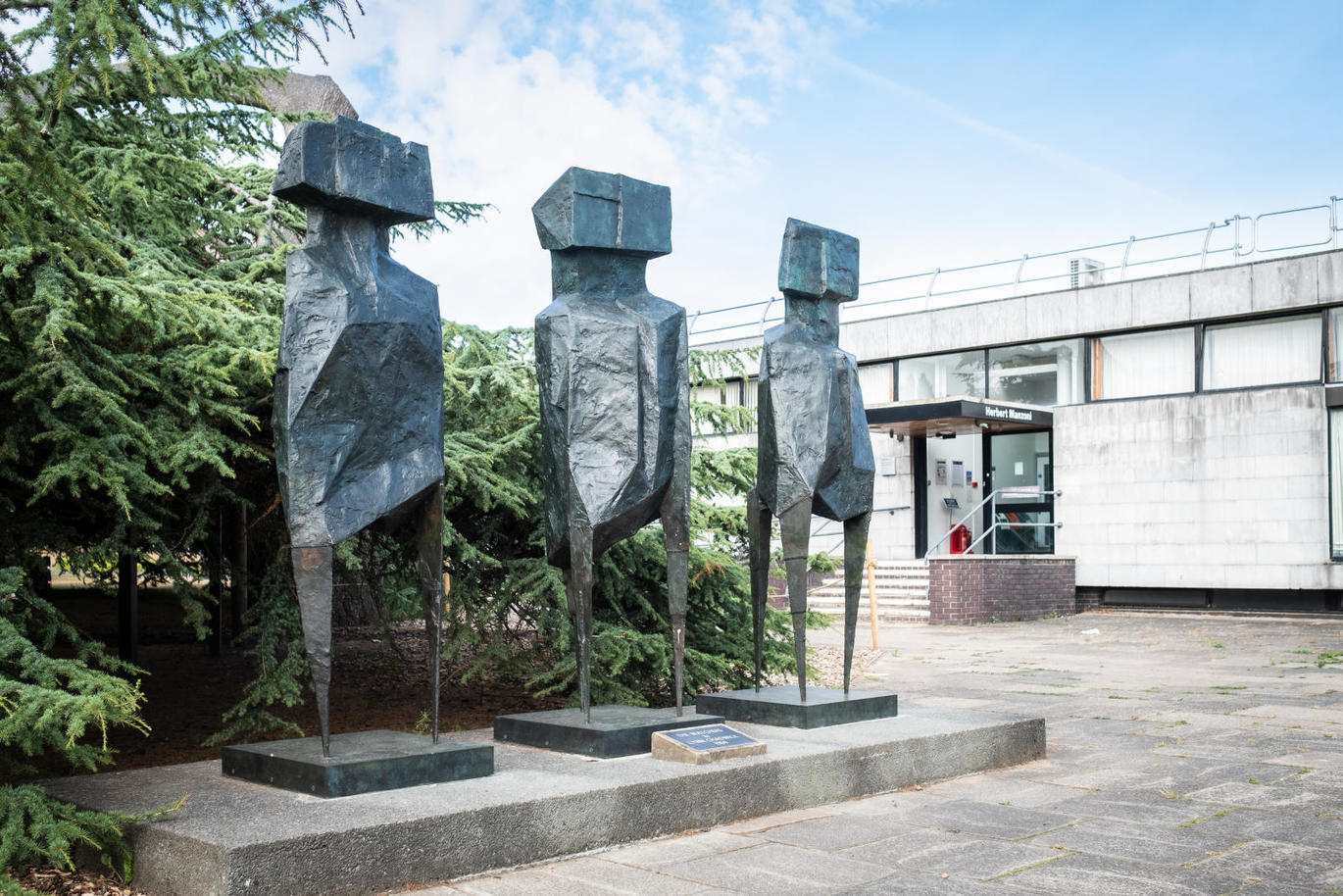Picture of the three watchers statues 