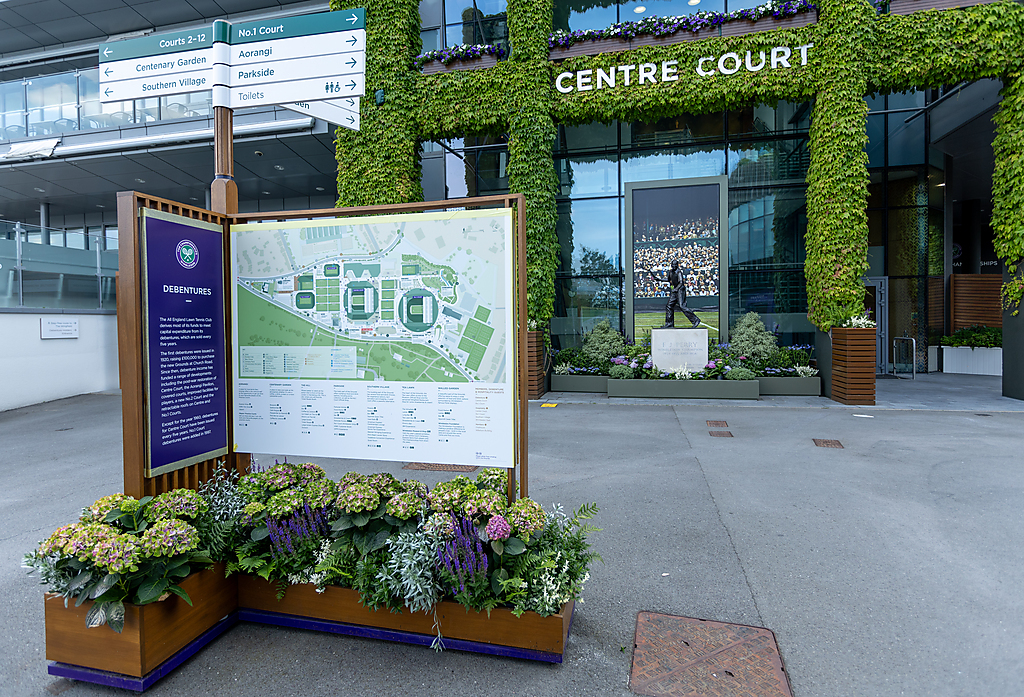 "Photograph shows a map and entrance to Wimbledon's Centre Court"