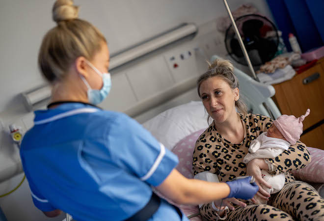 Image of a Midwife with a patient