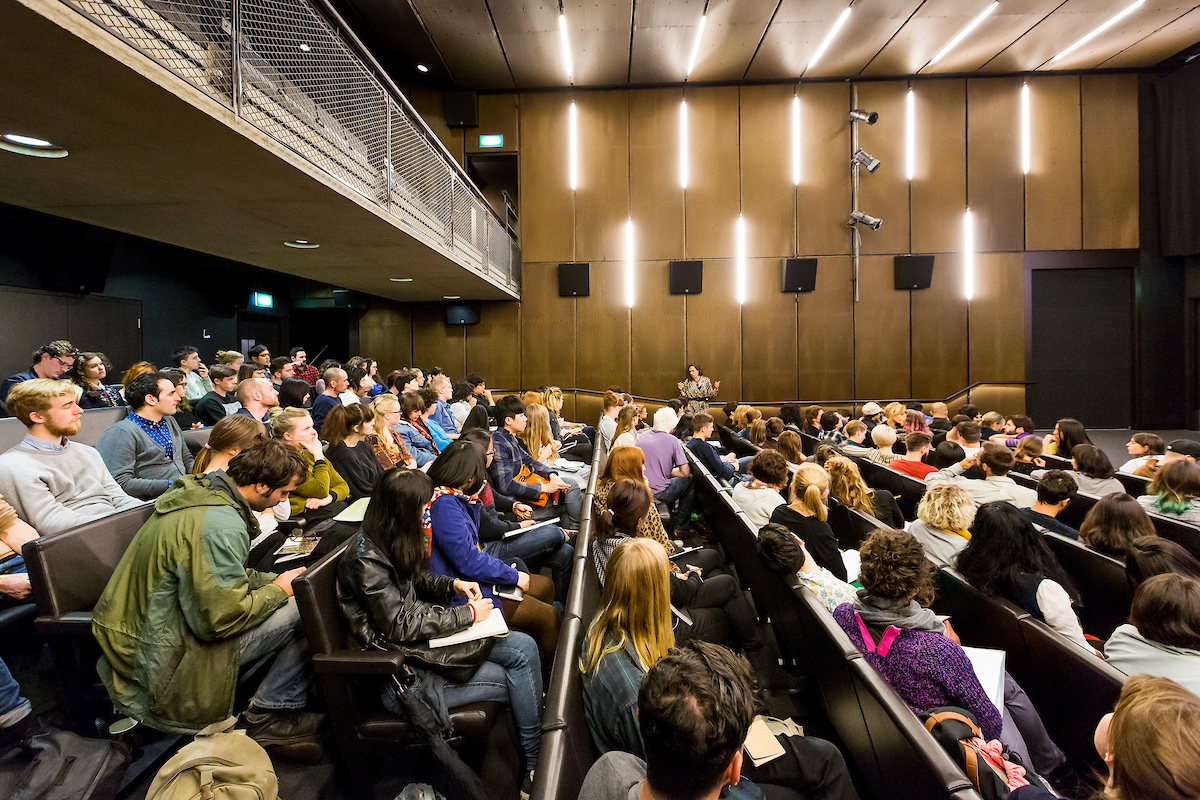"Gorvy Lecture Theatre in Dyson Building with people ready to begin their lecture"