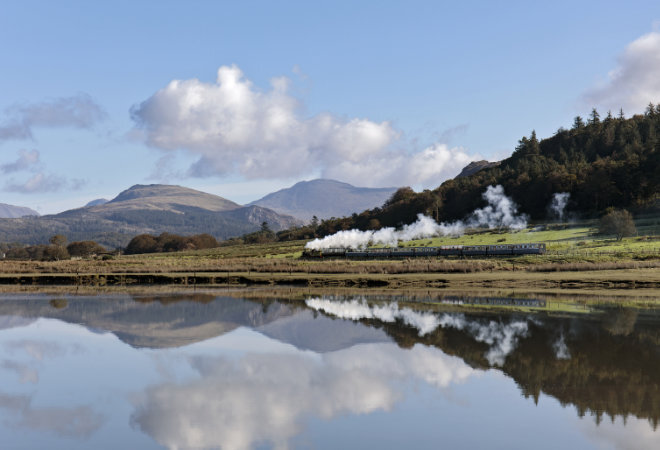 A scenic view of a steam train