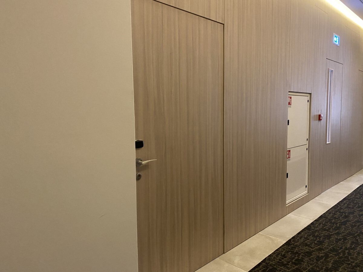 "Room Access along the hotel corridor"