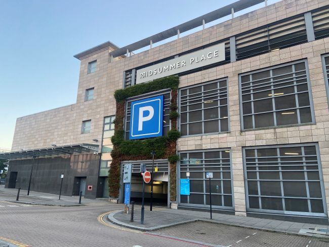Midsummer Place Car Park building, giant blue 'p' sign with Midsummer Place logo