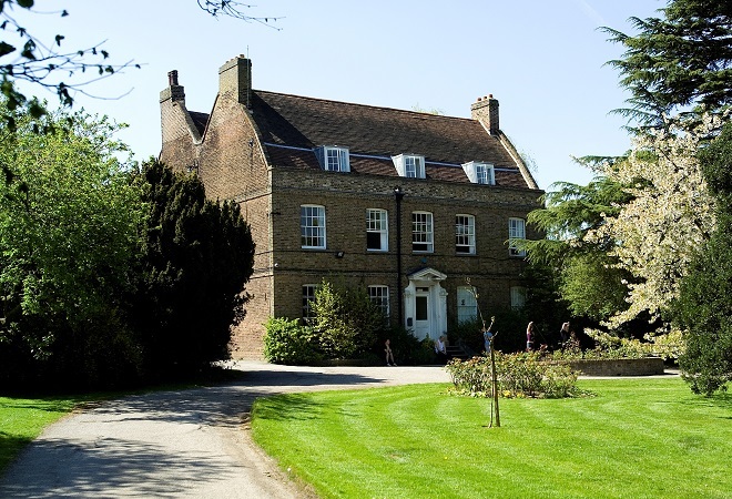 "Building on Loughton Campus. In foreground, driveway leading up to building and lawn area."