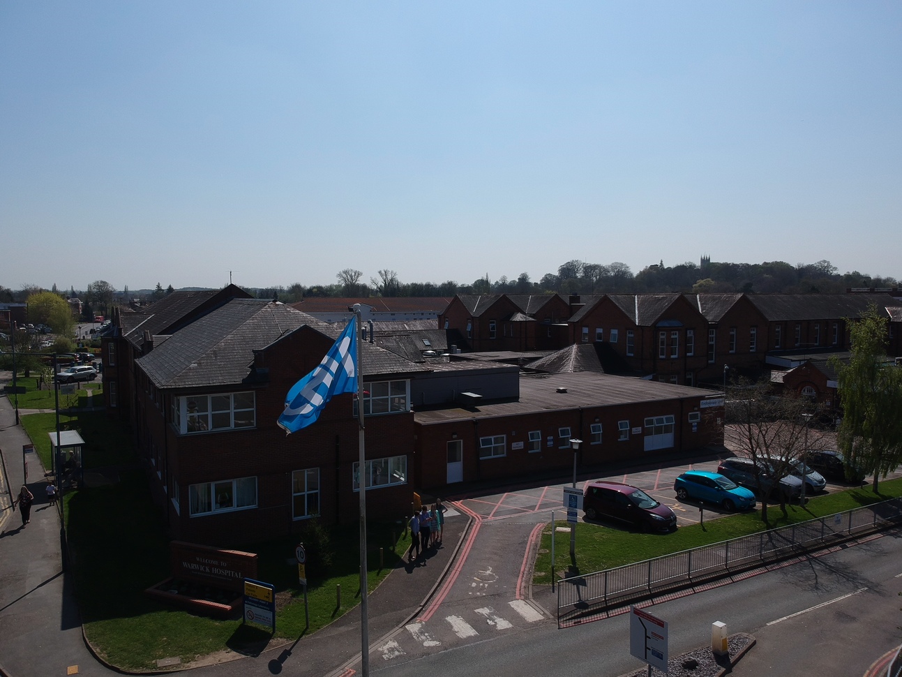 Sign directing to Warwick Hospital