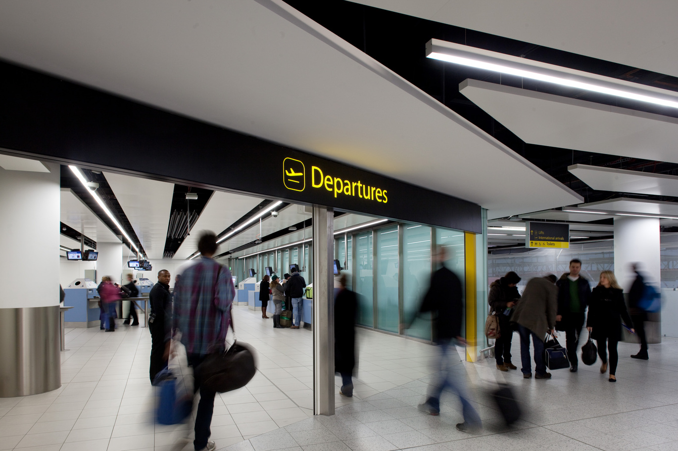 "People queuing to go through Security at London Gatwick South Terminal"