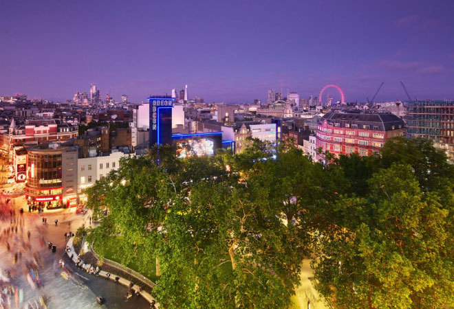 Photo of aerial view of Leicester Square at night time