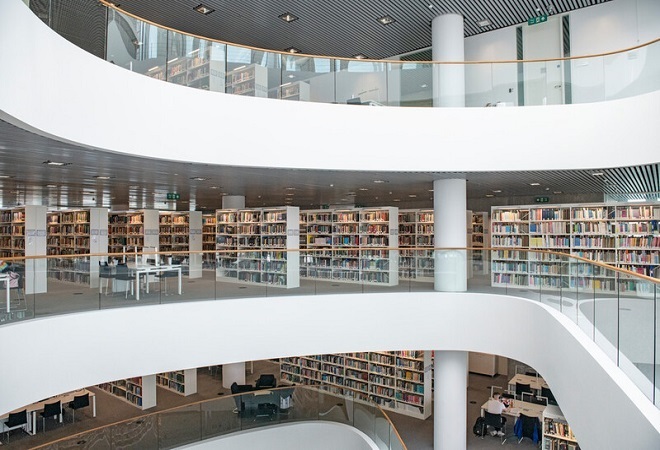 "Internal image of library showing stacks of books"
