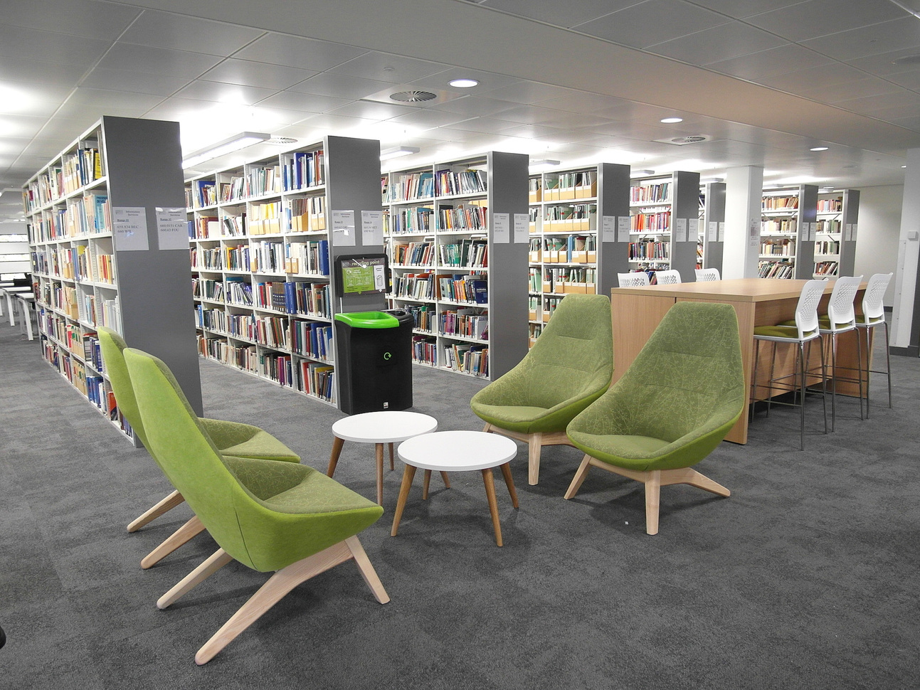 "Library with small student seating area in foreground"
