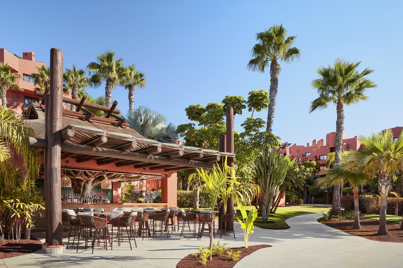 "A view of the terrace bar and pool bar"