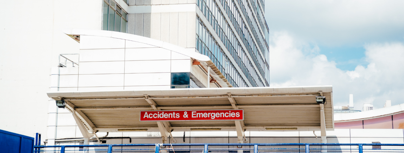 "Close up of The Hillingdon Hospital Accidents and Emergencies sign"