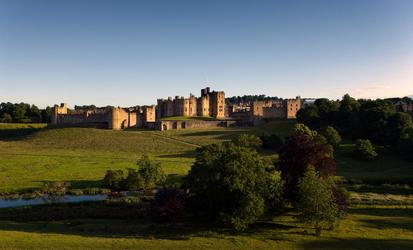  "A view of Alnwick Castle, Northumberland from across the Pastures designed by Capability Brown"