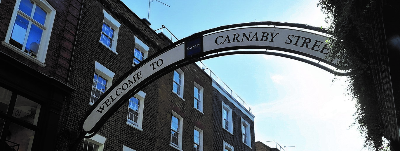 Photo of arch sign saying Carnaby Street