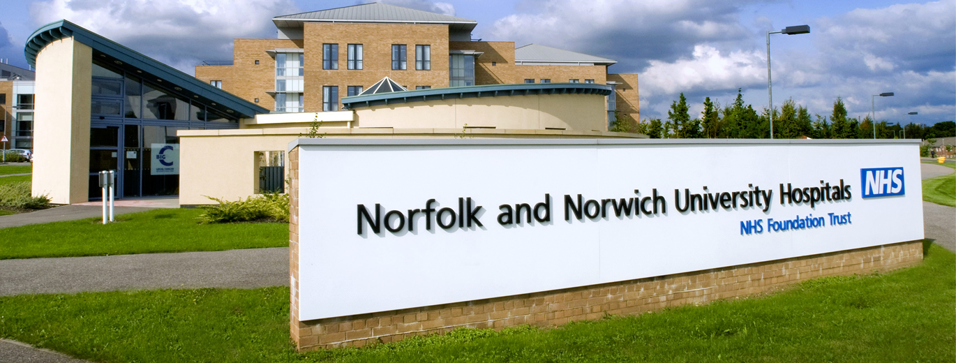 'Trust sign outside hospital with logo'