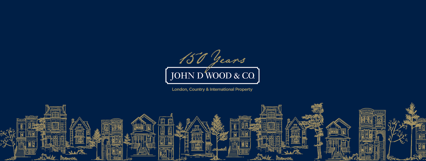 A navy background with houses illustrated along the bottom, with the John D. Wood & Co logo central. Above the logo '150 years' is written in a handwritten font