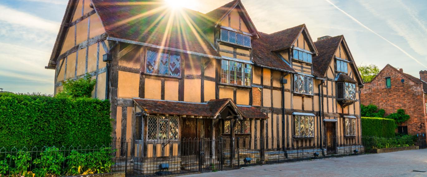 "A Tudor style house in the glistening sun"