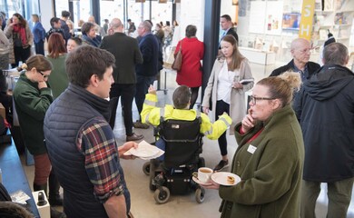 A crowd of people at the launch event