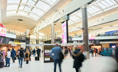 People walking through a busy South Terminal departure lounge