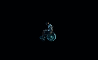 Man in wheelchair on black background