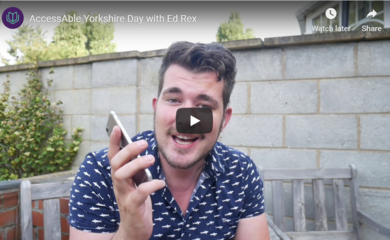 Ed Rex holding phone