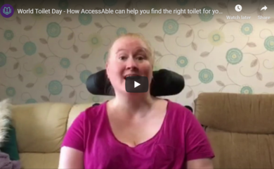 Kerry sitting in her wheelchair talking to camera