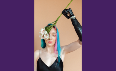Woman with prosthetic arm holding flower
