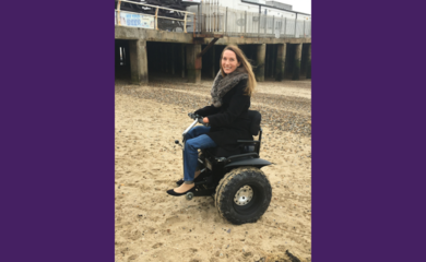 Helen Dolphin using an off road wheelchair on the sand
