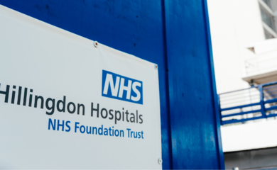 Image of a sign which says The Hillingdon Hospitals NHS Foundation Trust on a building.